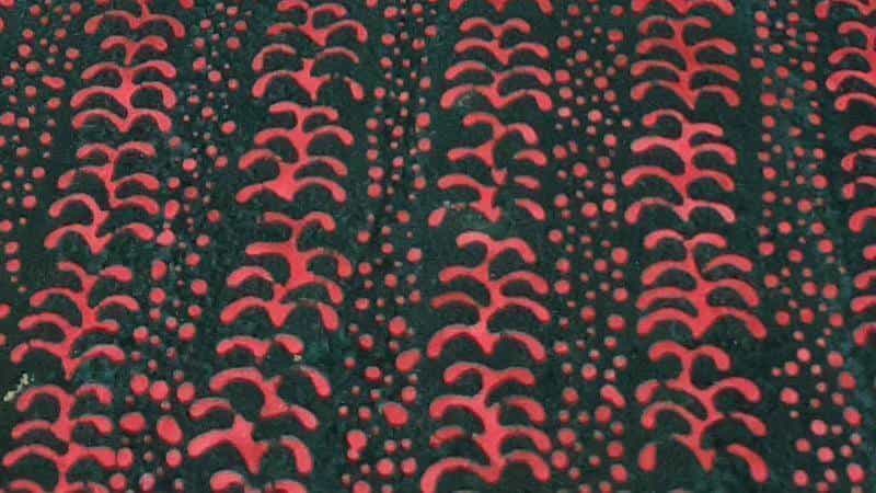 Batik Fabric In A Black And Red Print - Christina's Fabrics - Online Superstore. Shop now