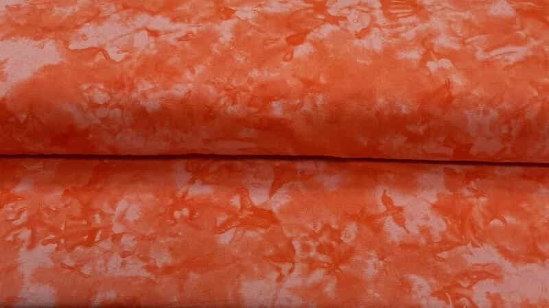 Batik Fabric In A Tangerine Orange - $5.99 Per 1/2 Meter - Christina's Fabrics Online Superstore. Shop now