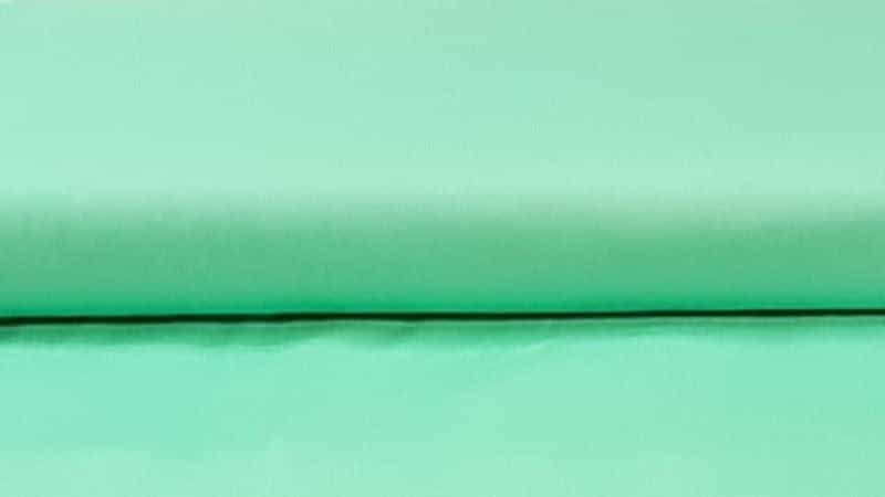 Cotton Fabric In A Solid Mint Green Color - Christina's Fabrics Online Superstore. Shop now
