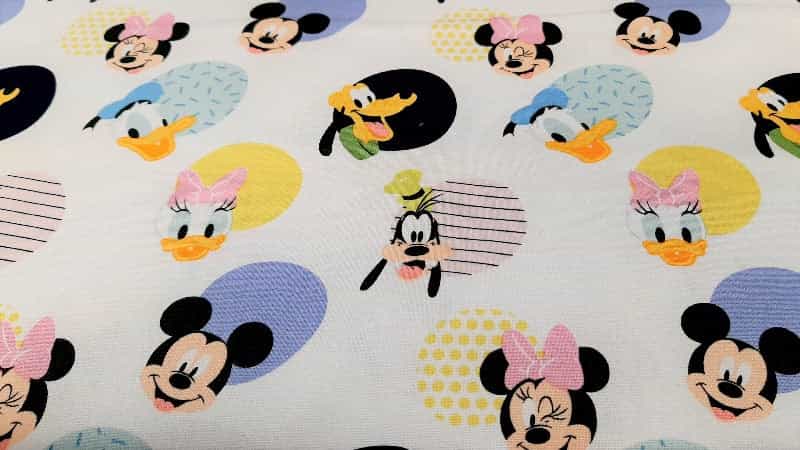Cotton Fabric In White Mickey & Minnie - Christina's Fabrics Online Superstore. Shop now