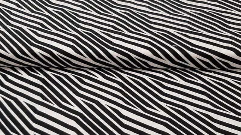 Cotton Fabric In White and Black Print - $5.25 - Christina's Fabrics Online Superstore. Shop now