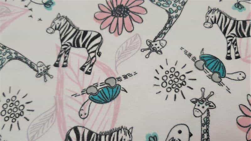 Flannel Fabric In White and Pink With An Animal Print - Christina's Fabrics - Online Superstore. Shop now