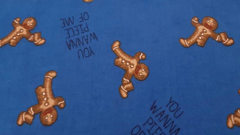 Flannelette Fabric In A Blue With A Gingerbread Print - Christina's Fabrics - Online Superstore. Shop now