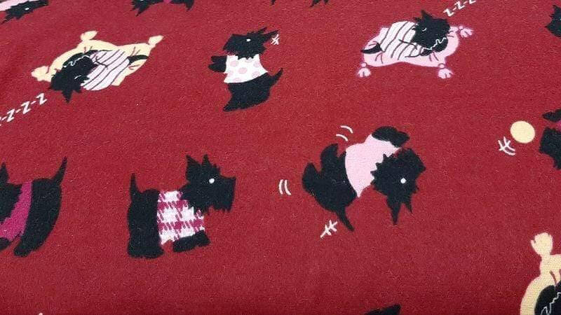 Flannelette Fabric In Burgundy With A Scottie Dog Print - Christina's Fabrics Online Superstore. Shop now
