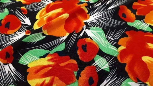 Knit Fabric In A Black And Orange Floral Print - Christina's Fabrics - Online Superstore.  Shop now 