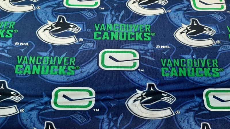 NHL Vancouver Canucks - 12.75 per half meter - Christina's Fabrics Online Superstore. Shop now