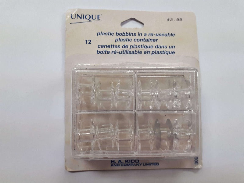 Plastic Bobbins In Re-Usable Container - Christina's Fabrics - Online Superstore. Shop now