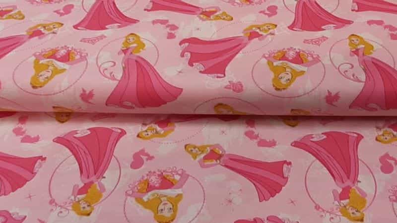 Cotton Fabric In Pink With Disney's "Sleeping Beauty" - Christina's Fabrics Online Superstore. Shop now