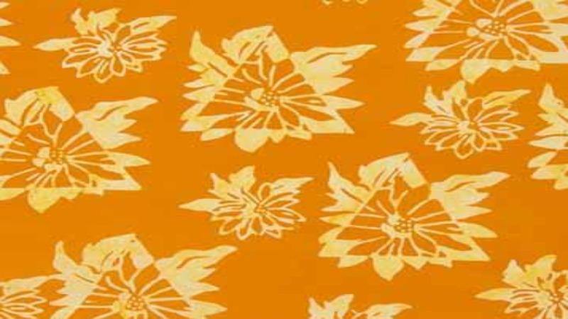 Batik Fabric In An Orangish/Yellowish Daisy Print - Christina's Fabrics - Online Superstore.  Shop now 