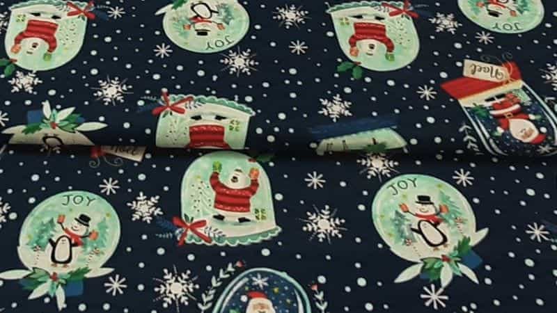 Christmas Cotton Fabric In A Dark Blue Color With A Snowglobe Print - Christina's Fabrics Online Superstore.  Shop now 