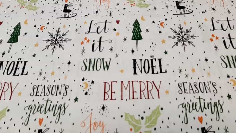 Cotton Christmas Fabric In White With Greetings - Christina's Fabrics Online Superstore.  Shop now 