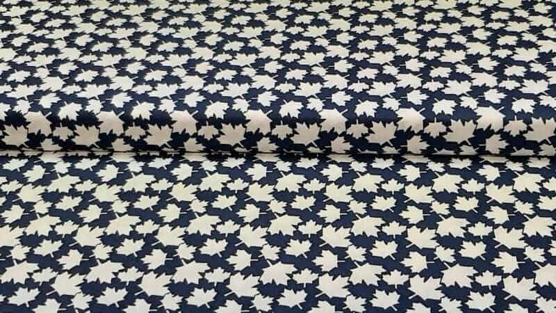 Cotton Fabric In Blue With A Small White Maple Leaf - Christina's Fabrics - Online Superstore.  Shop now 