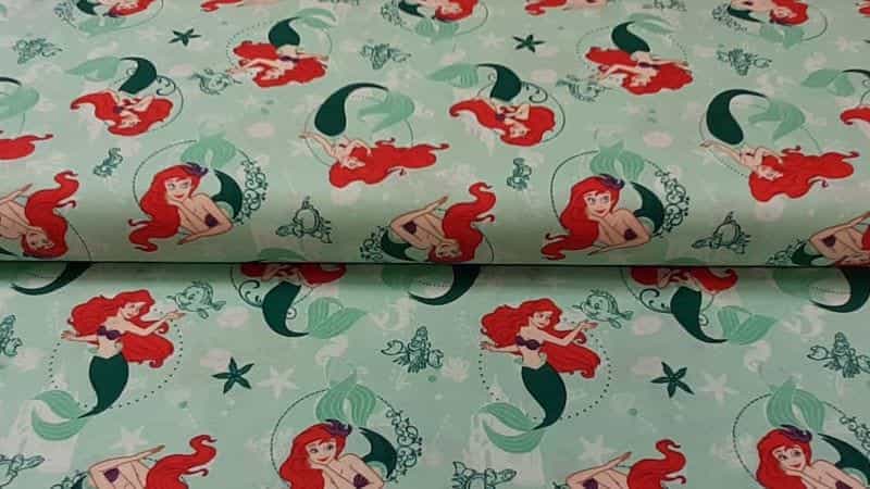 Cotton Fabric In Green With Disney's Little Mermaid Print - Christina's Fabrics Online Superstore.  Shop now 