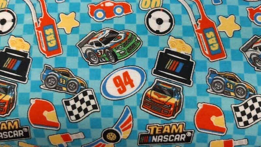 Flannel Fabric In A Blue Color With A  Nascar Print - Christina's Fabrics Online Superstore.  Shop now 