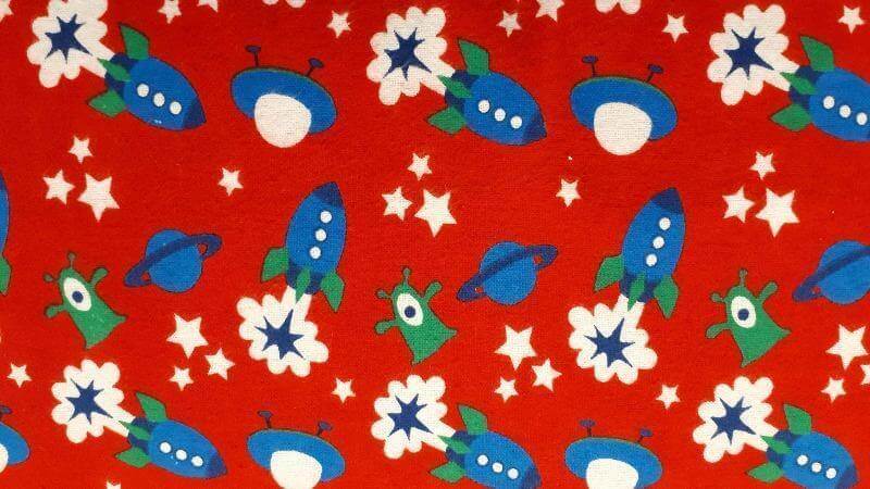 Flannel Fabric In Red With A Spaceship Print - Christina's Fabrics - Online Superstore.  Shop now 